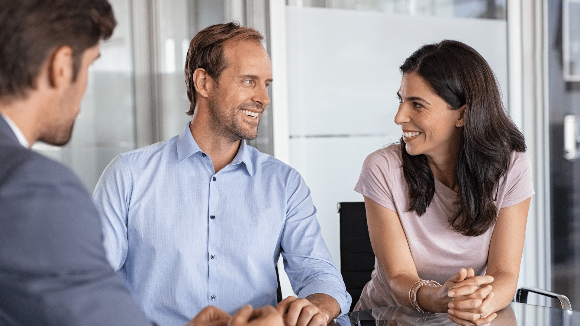 Advisor talking to happy couple